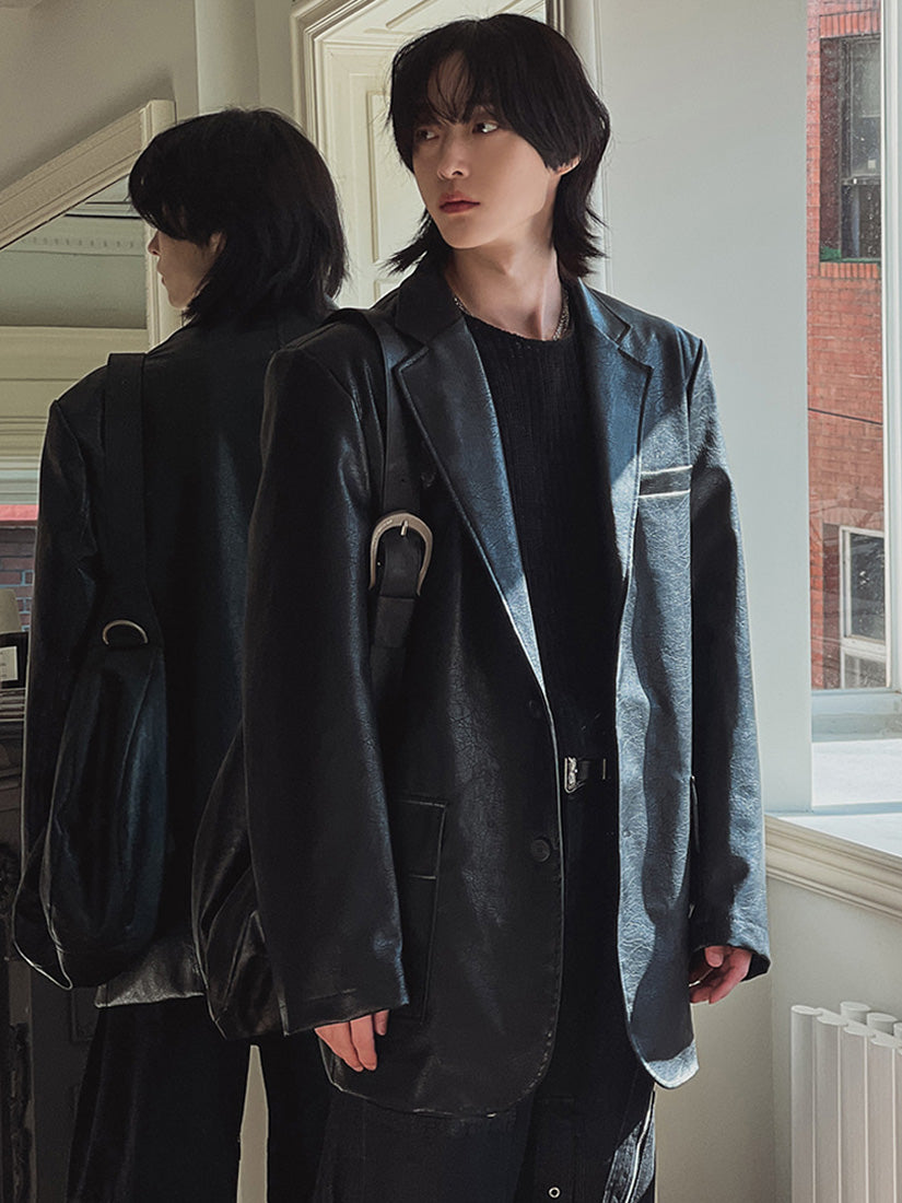 Pit crack leather over blazer 