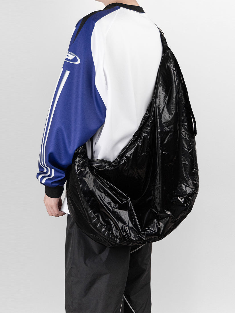 Glossy oversized padded cross bag 
